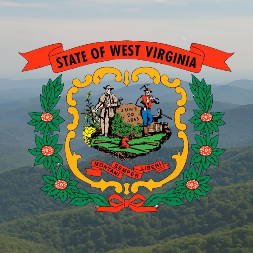 west virginia climate in the summer represented in the mountains with the flag emblem in the forefront