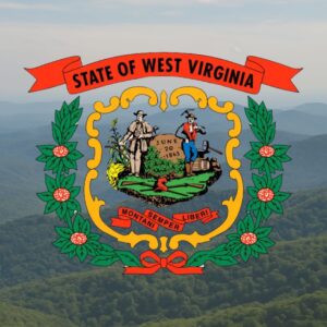 west virginia climate in the summer represented in the mountains with the flag emblem in the forefront